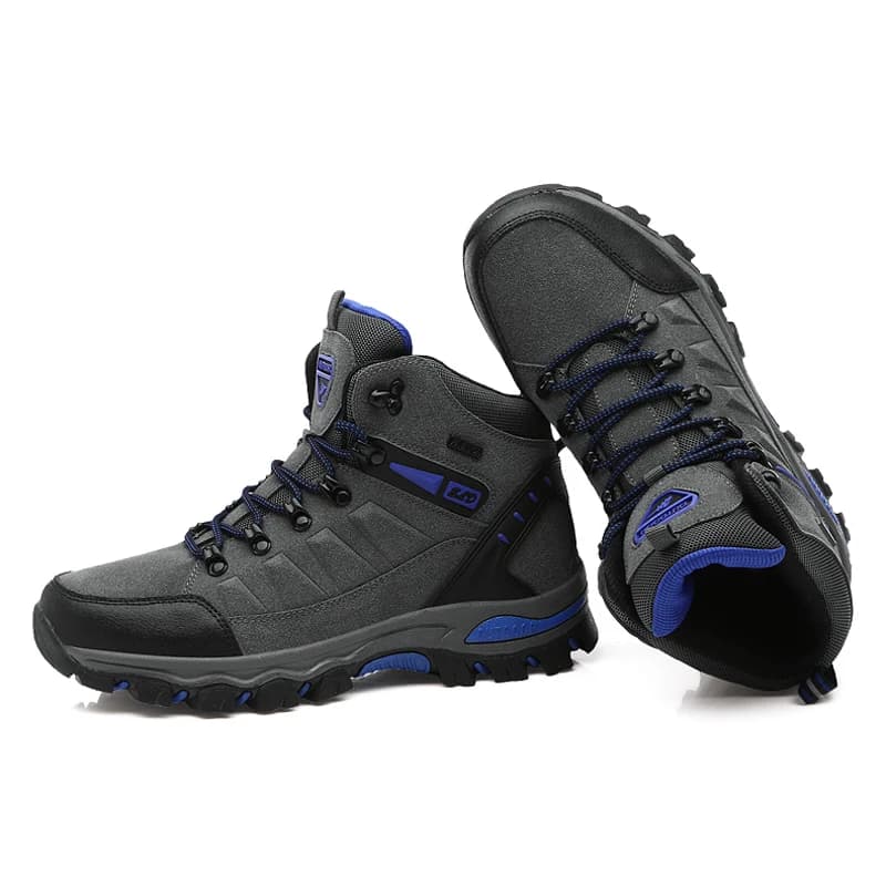 Bota de trekking feminina cinza com detalhes azuis, sola robusta de borracha e fechamento com cadarço