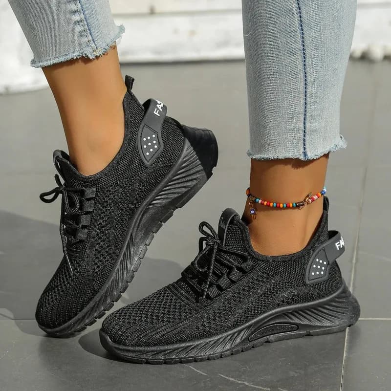 Tênis Fly Weaving Mesh feminino preto com solado grosso e malha respirável estilo fashion para uso atlético