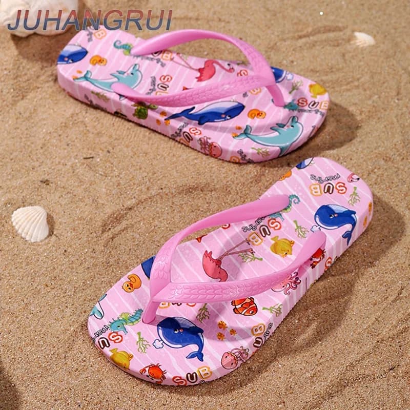 Chinelo infantil rosa com tira traseira em EVA e estampa de animais marinhos coloridos