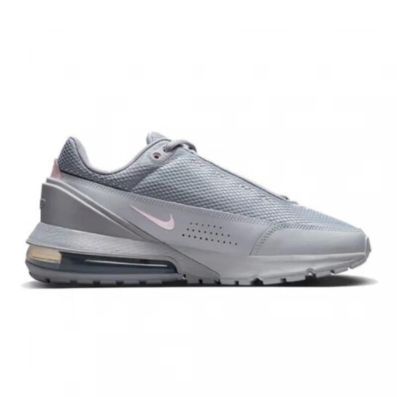 Tênis Nike Air Max feminino cinza com solado amortecedor visível e design casual esportivo