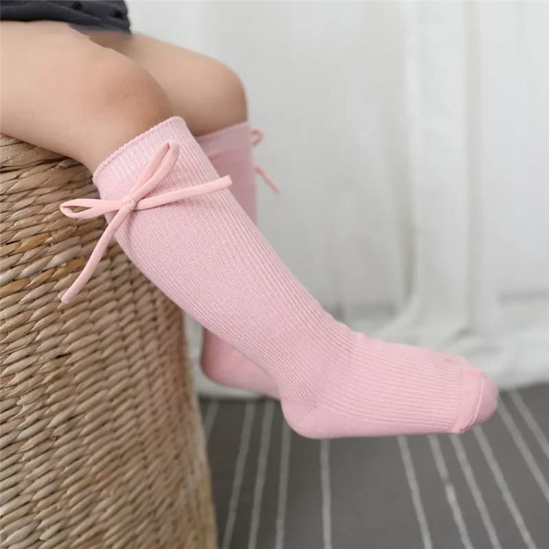 Outono crianças joelho meias altas do bebê meninas meninos bowknot plana longa meia de algodão macio sólido crianças princesa socken para 0-7 anos