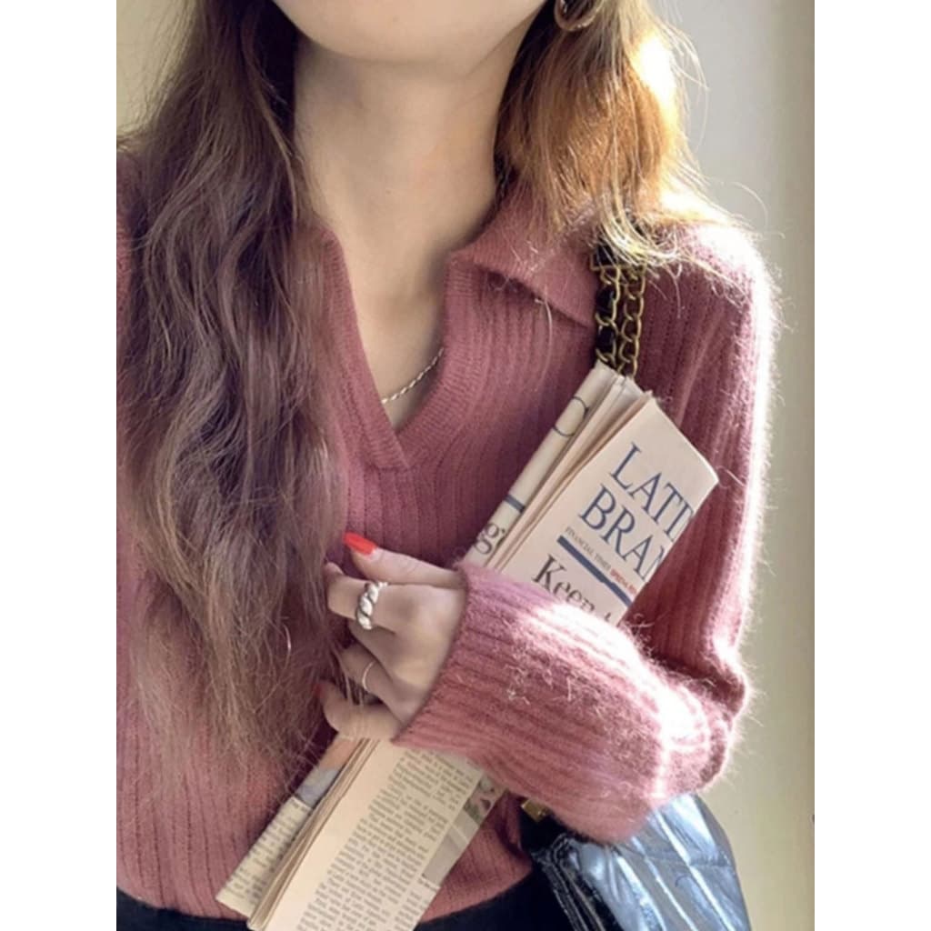 Meia gola aberta Merino 100 camisola de lã pura feminina 2026 primavera novo estilo High-End lapela solta camisola de ma
