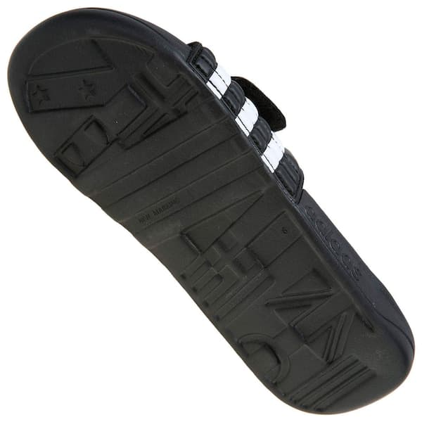 Sola da sandália Adidas Adissage Slide Masculino, preta com detalhes brancos.