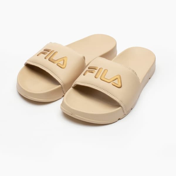 Sandália Fila Drifter Basic bege para mulheres, com logo em relevo, estilo casual.