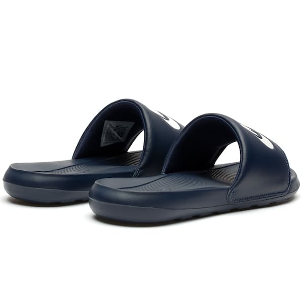 Nike Victori Slide Masculino em couro azul marinho com logo branco.