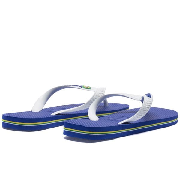 Chinelo Havaianas Brasil Logo Masculino, azul com tiras brancas e detalhes verde e amarelo.