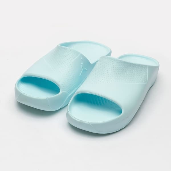 Par de chinelos brancos Nike Jordan Post Slide com design minimalista