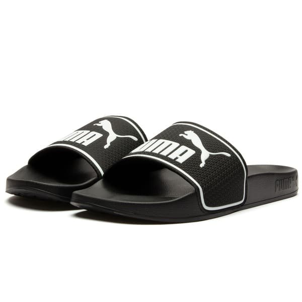 Puma Leadcat 20 Slide Adulto preto com detalhes brancos, estilo minimalista.