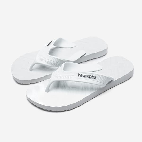 Havaianas Track Waves, chinelos masculinos brancos com design ondulado e logo.