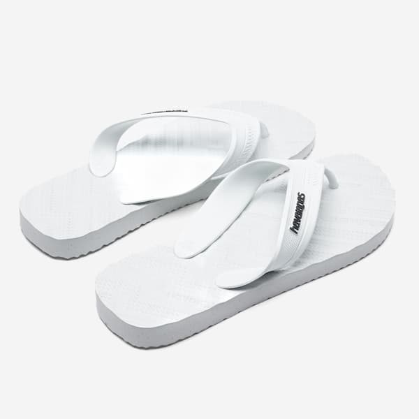 Havaianas Track Waves, chinelos masculinos brancos com design ondulado e sola texturizada.