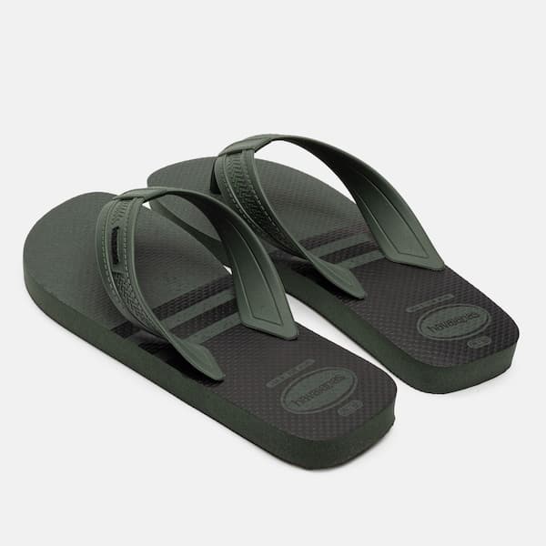 Chinelo masculino Havaianas City Basic verde com sola texturizada e detalhes em cinza.