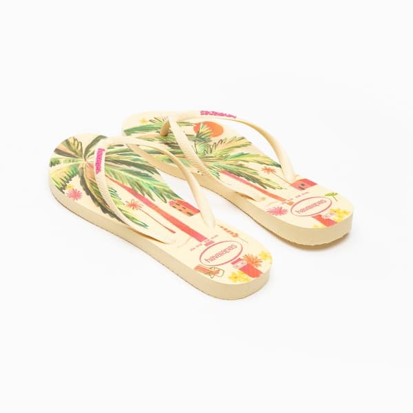 Havaianas Slim Summer Bliss, chinelo adulto amarelo com estampa tropical.