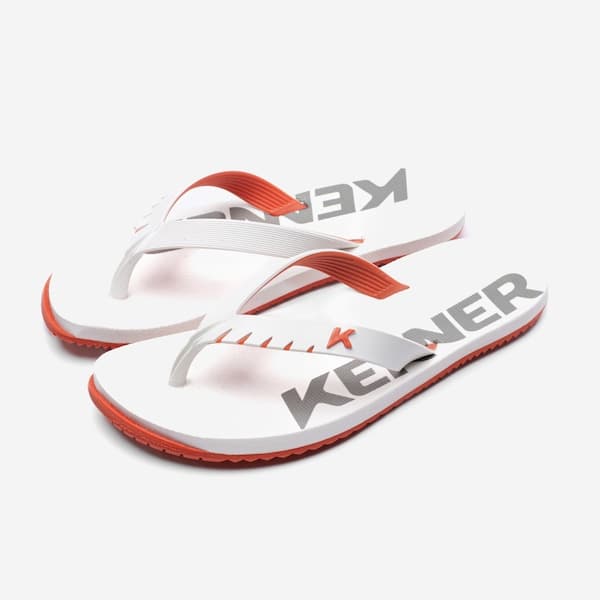 Par de flip flop Kenner Red Pro unissex branco e vermelho com logo Kenner.