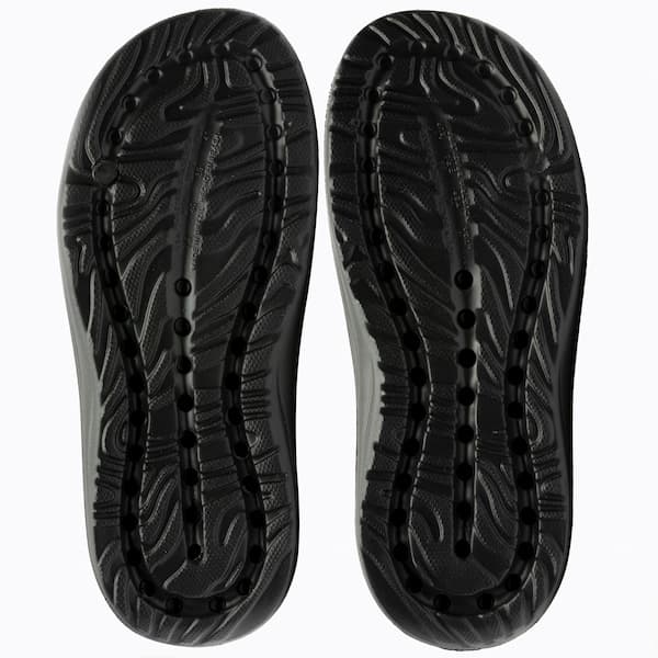 Sola de chinelo slide Adams Space preto com design de ventilação e textura perfurada.
