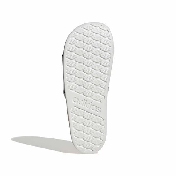 Solado branco da Adidas Adilette Comfort 2.0 flip flop com logo da marca.