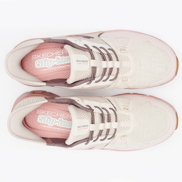 Tênis Skechers feminino branco e rosa respirável com design slip-ins.