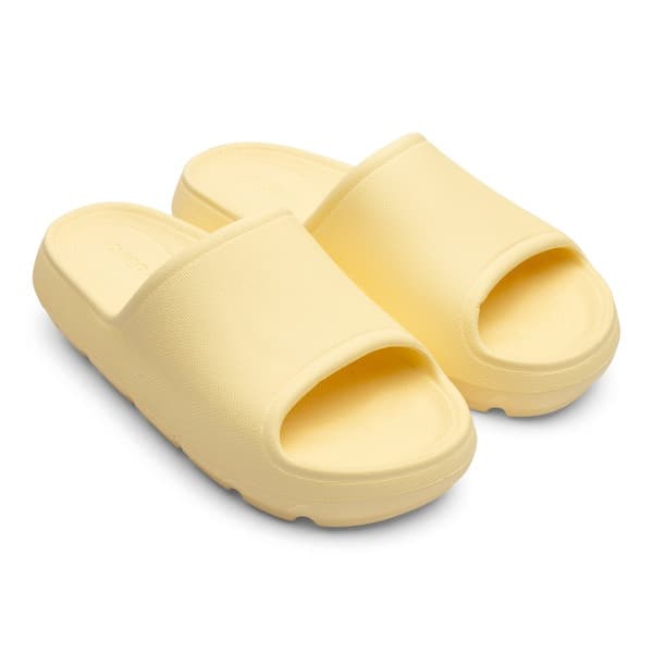 Par de chinelos de dedo Oxer Vega amarelo, com design moderno e material leve, ideal para casa.