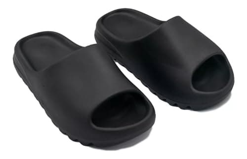 Chinelo preto de dedo com design minimalista e sola texturizada