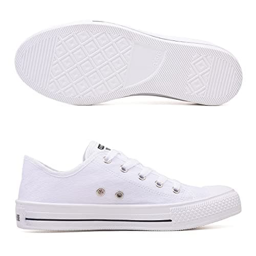 Tênis feminino branco casual, cano baixo, vista da sola com padrão quadriculado.