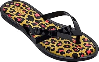 Sandália feminina Melissa Flip Flop Animal com estampa de oncinha e tiras pretas.