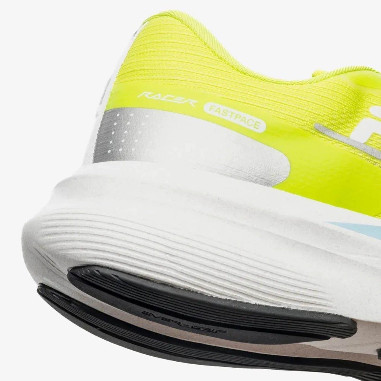 Detalhe da sola do tênis FILA Racer Fastpace para corrida feminino amarelo.